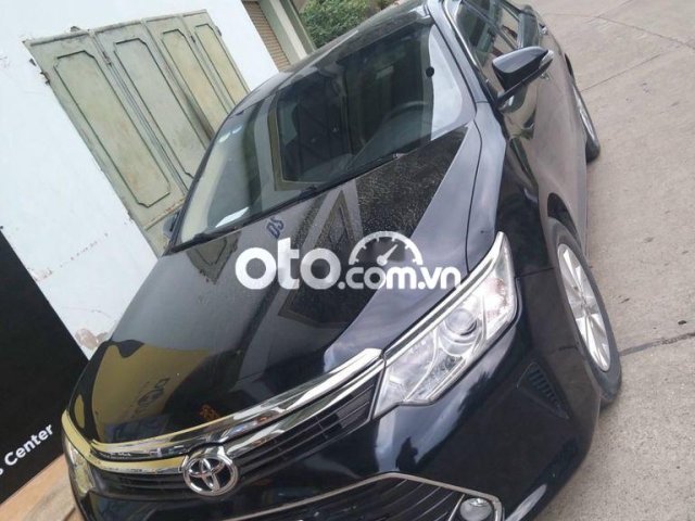 Cần bán gấp Toyota Camry 2015, màu đen, nhập khẩu, 668tr