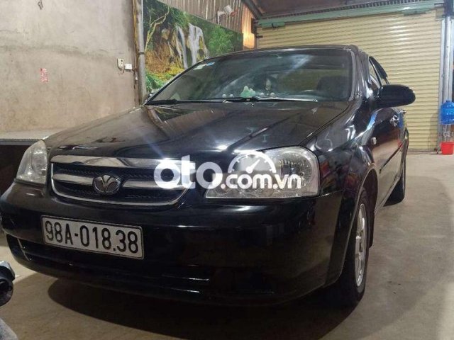 Xe Daewoo Lacetti đời 2009, màu đen0