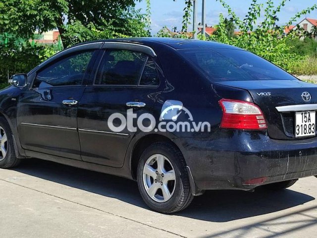 Cần bán lại xe Toyota Vios E sản xuất năm 2009, màu xanh đen0