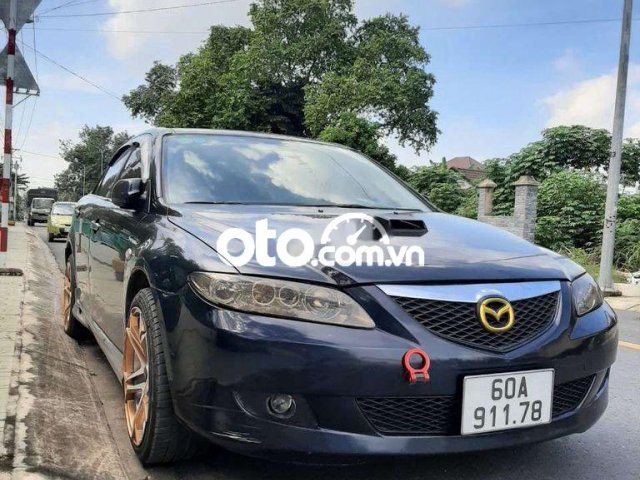 Cần bán lại xe Mazda 6 2005, màu xanh lam còn mới0