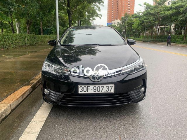 Bán Toyota Corolla Altis 1.8G đời 2019, màu đen0