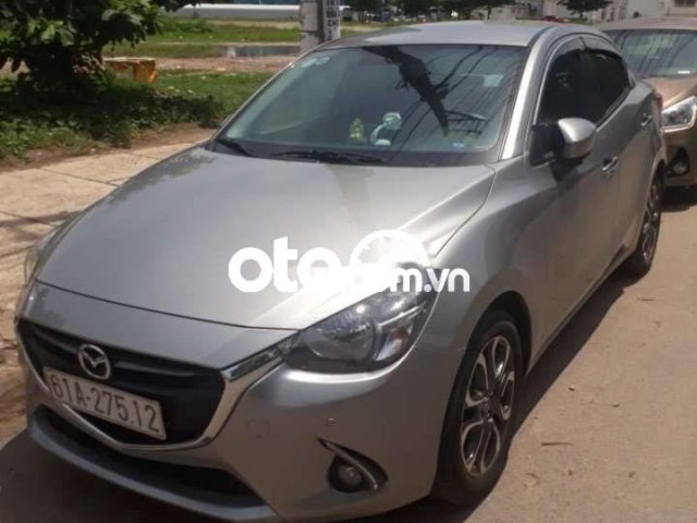 Bán Mazda 2 sản xuất 2016, màu bạc, nhập khẩu nguyên chiếc xe gia đình, giá chỉ 410 triệu0