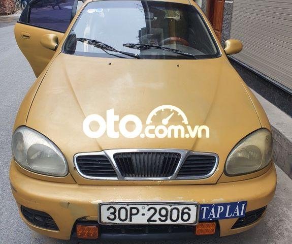 Cần bán lại xe Daewoo Lanos sản xuất 2002, màu vàng, nhập khẩu nguyên chiếc0