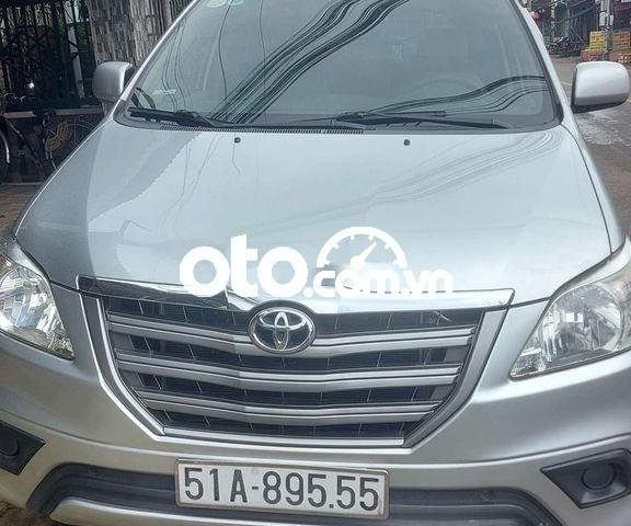 Cần bán Toyota Innova đời 2014, màu bạc  0