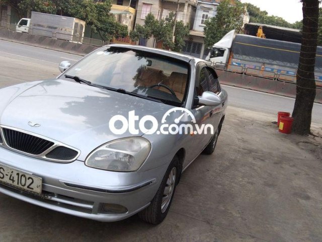 Cần bán gấp Daewoo Nubira đời 2002, màu bạc, nhập khẩu 