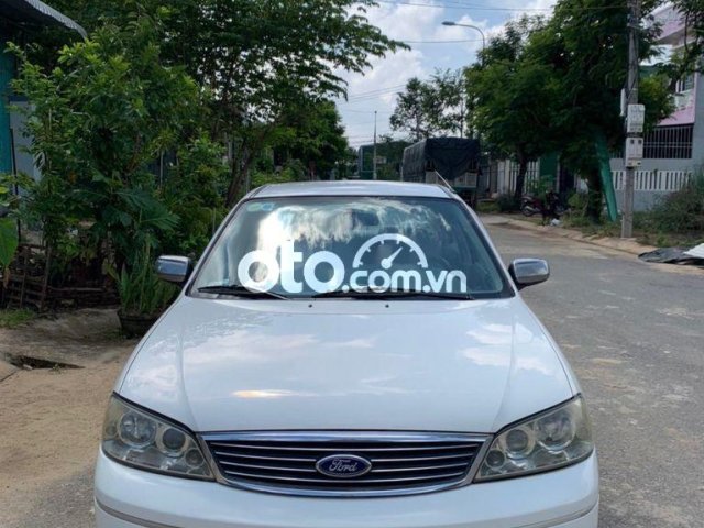 Cần bán gấp Ford Laser năm sản xuất 2004, màu trắng còn mới, 145tr