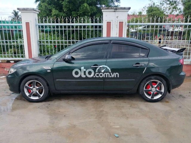 Cần bán gấp Mazda 3 đời 2004 chính chủ0