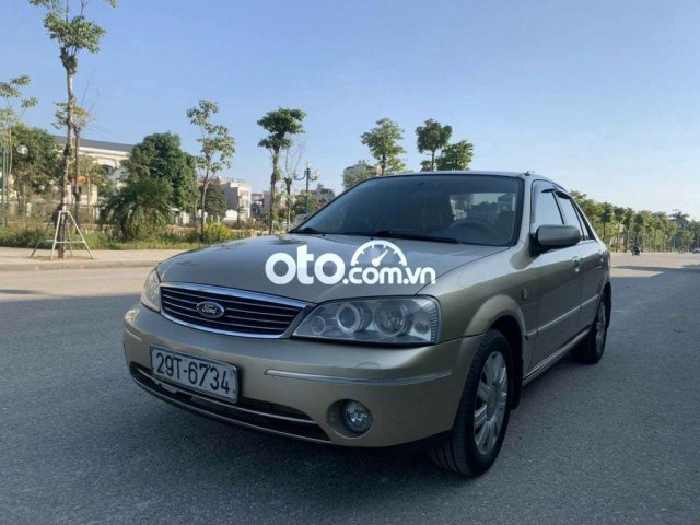 Bán ô tô Ford Laser Ghia 2003 số sàn giá cạnh tranh0