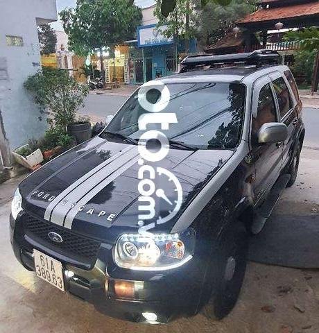 Cần bán Ford Escape sản xuất năm 2003, màu đen, xe nhập xe gia đình