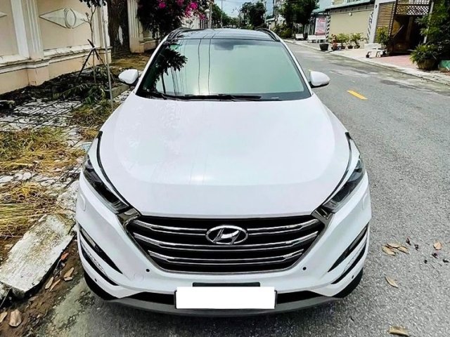 Xe Hyundai Tucson 1.6 AT Turbo sản xuất năm 2017, màu trắng còn mới giá cạnh tranh0