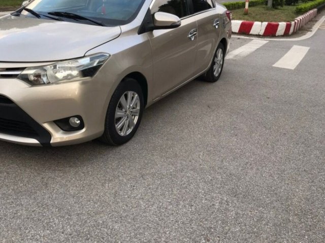 Cần bán Toyota Vios 1.5 E 2015, màu vàng0