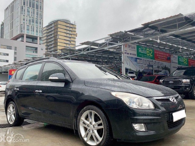 Bán Hyundai i30 CW 1.6 AT đời 2009, màu đen, xe nhập0