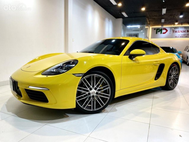 Bán Porsche 718 Cayman, sản xuất 2018, màu vàng, lăn bánh lướt - full options0