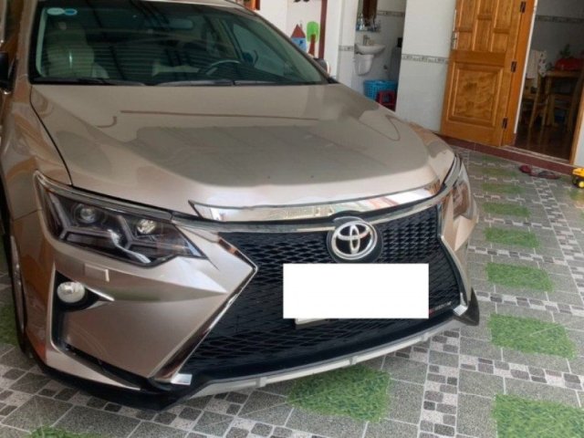 Cần bán lại xe Toyota Camry 2.5G đời 2013, màu vàng, 640 triệu0