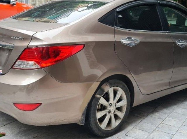 Cần bán Hyundai Accent đời 2011, màu nâu, nhập khẩu nguyên chiếc giá cạnh tranh0