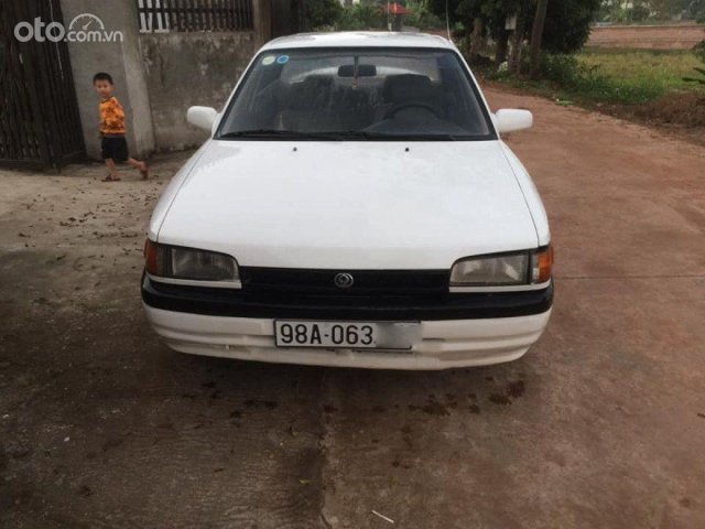 Cần bán gấp Mazda 323 1.6 MT 1995, màu trắng, giá tốt