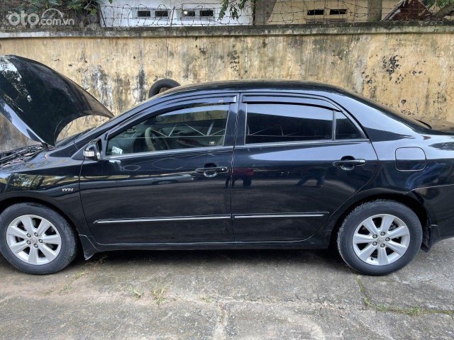 Cần bán gấp Toyota Corolla 1.8G AT sản xuất 2010, màu đen0