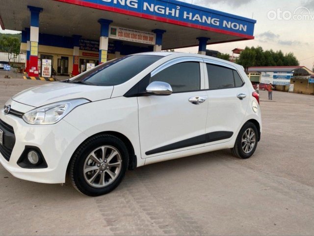 Bán Hyundai Grand i10 năm sản xuất 2014, màu trắng, nhập khẩu nguyên chiếc còn mới, giá chỉ 305 triệu0