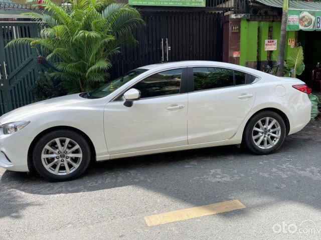 Cần bán Mazda 6 2.0 AT đời 2014, màu trắng  0