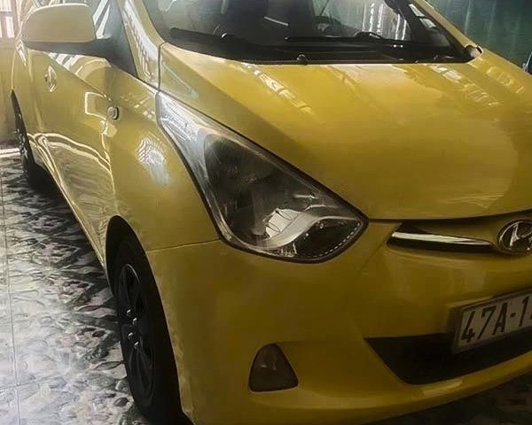 Bán xe Hyundai Grand i10 năm 2012, màu vàng 0