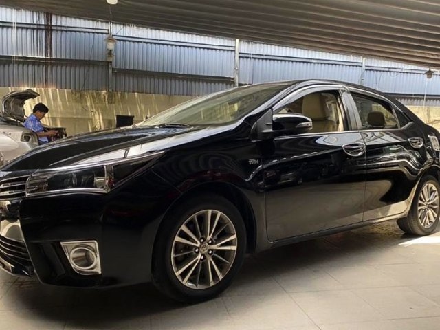 Cần bán Toyota Corolla Altis 1.8G năm 2016, màu đen, 585tr0