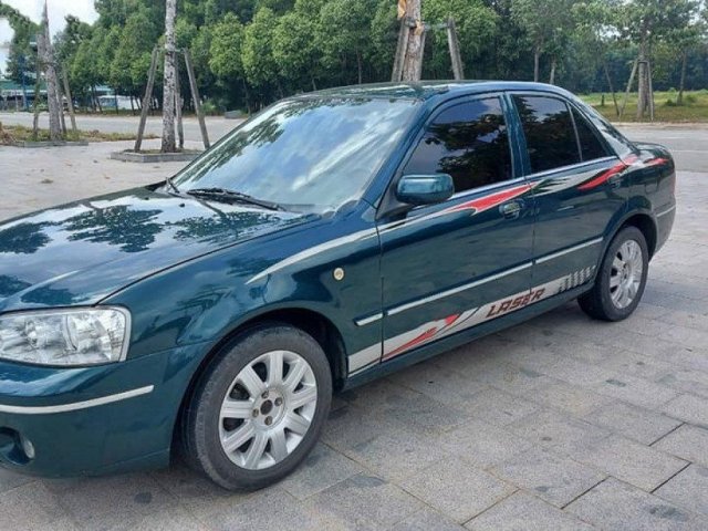 Cần bán Ford Laser GHIA 1.8 MT năm 2004, màu xanh lam 