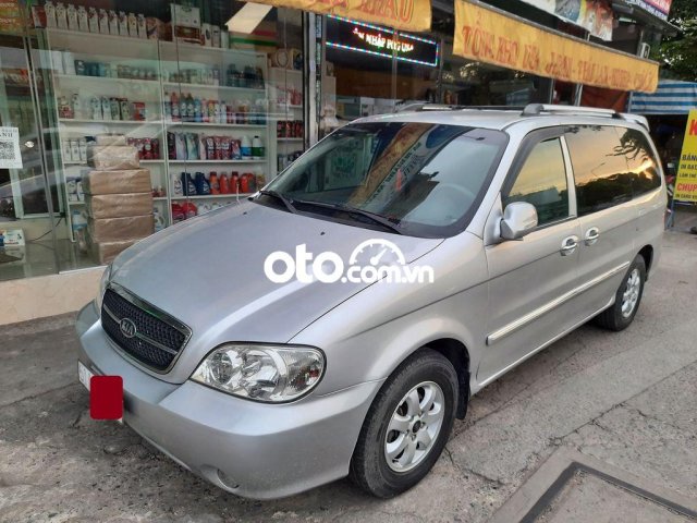 Cần bán gấp Kia Carnival sản xuất 2009