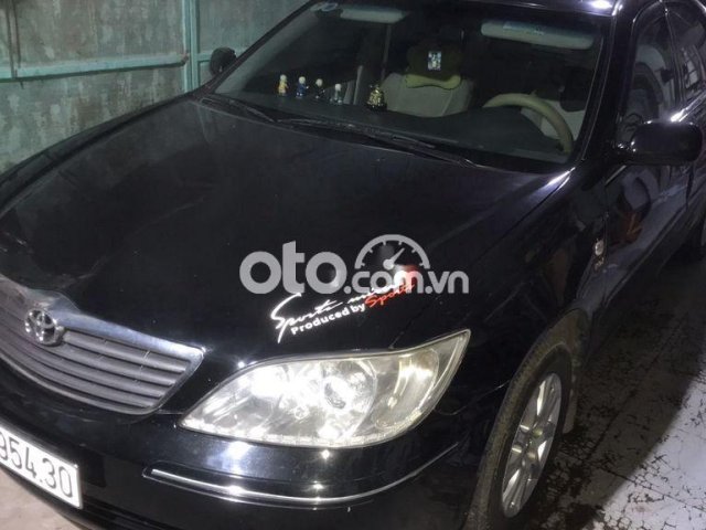 Bán Toyota Camry Xli MT năm sản xuất 2003, màu đen