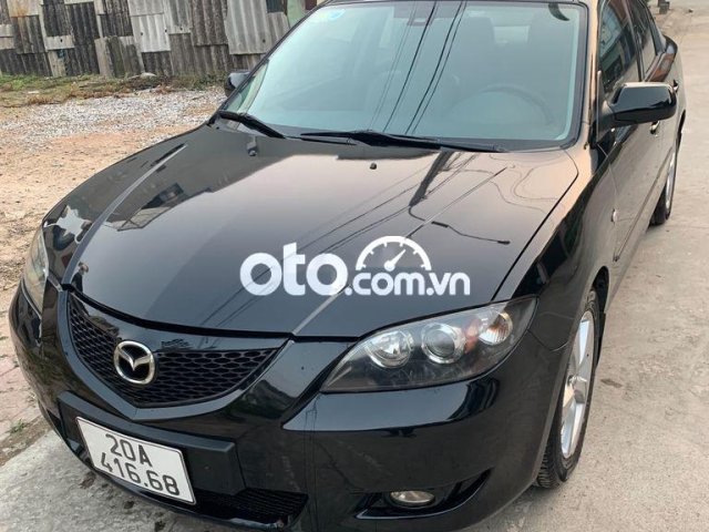 Cần bán lại xe Mazda 3 đời 2005, màu đen, nhập khẩu