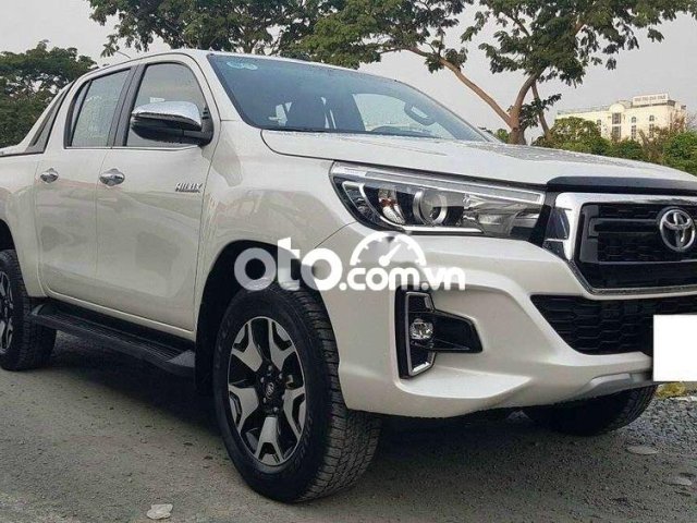 Bán ô tô Toyota Hilux 3.0G 4x4AT sản xuất 2018, màu trắng, xe nhập