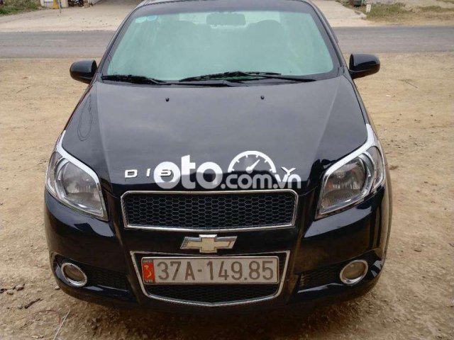 Bán Chevrolet Aveo LT đời 2013, màu đen xe gia đình