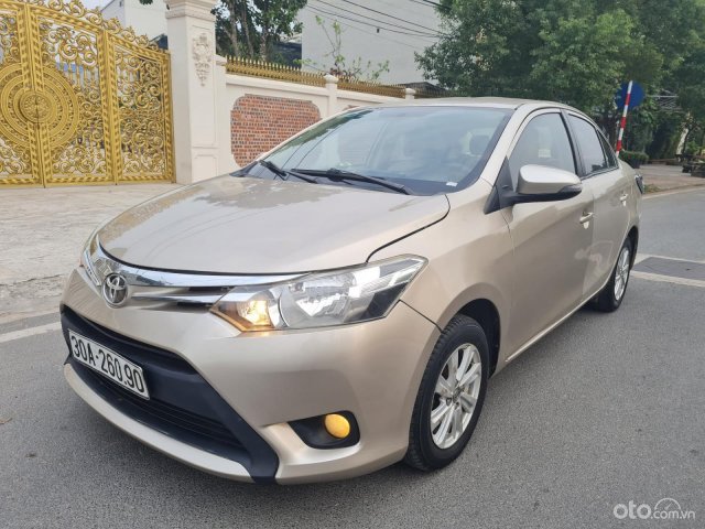 Cần bán lại xe Toyota Vios MT sản xuất năm 2016, màu kem (be)