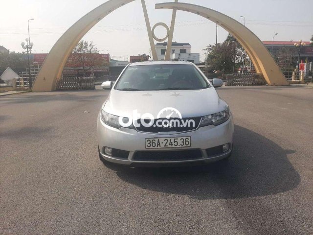 Cần bán gấp Kia Cerato AT đời 2010, màu bạc, nhập khẩu số tự động