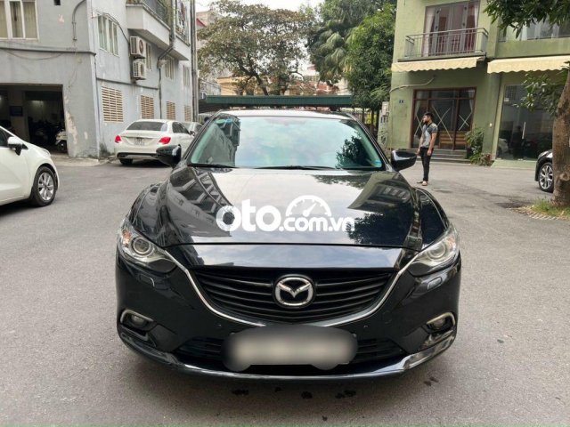 Chính chủ cần bán xe Mazda 6 2.0 đời 2015, màu đen