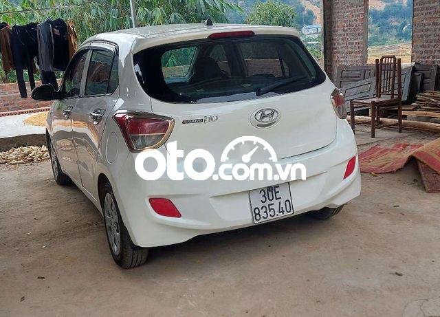 Cần bán gấp Hyundai Grand i10 sản xuất năm 2014, màu trắng, nhập khẩu xe gia đình