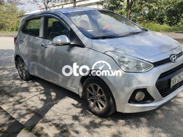 Cần bán xe Hyundai Grand i10 MT năm 2014, màu bạc, xe nhập