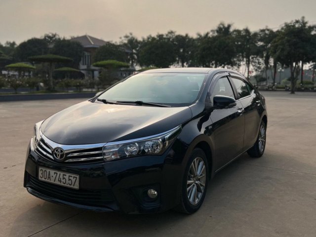 Cần bán xe Toyota Corolla 1.8 G sản xuất năm 2015, màu đen0