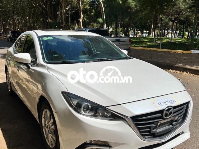 Cần bán Mazda 3 1.5L Deluxe sản xuất 2016, màu trắng, nhập khẩu nguyên chiếc