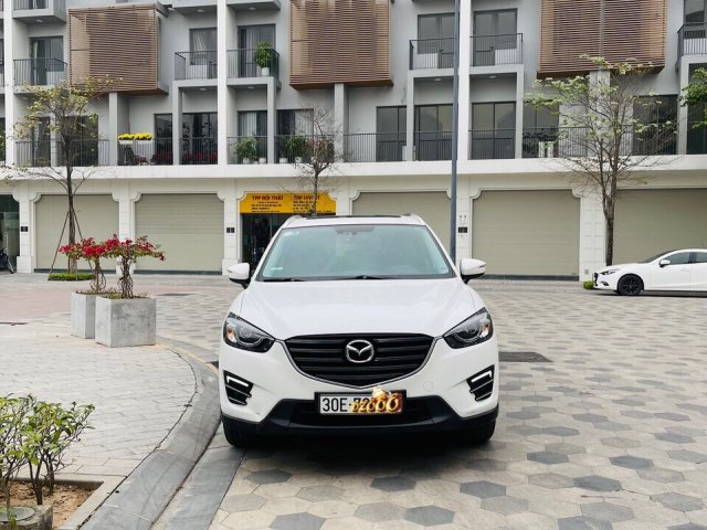 Bán gấp xe Mazda CX-5 2.0AT màu trắng, năm sản xuất 2016, giấy tờ đầy đủ, sang tên nhanh gọn2