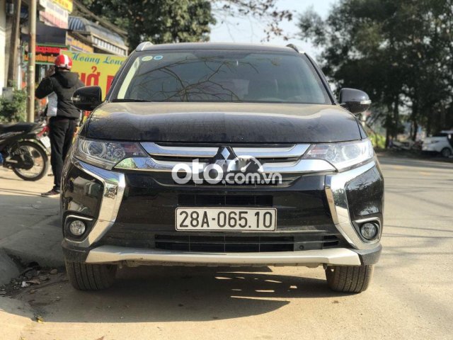 Cần bán lại xe Mitsubishi Outlander 2.0CVT năm sản xuất 2018, màu đen còn mới, giá 675tr