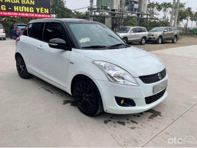 Bán Suzuki Swift 1.4 AT sản xuất năm 2014, màu trắng