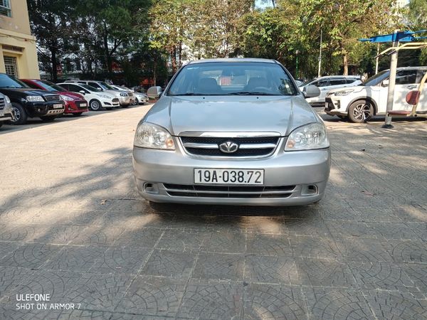 Cần bán lại xe Daewoo Lacetti EX MT sản xuất 2010, màu bạc0