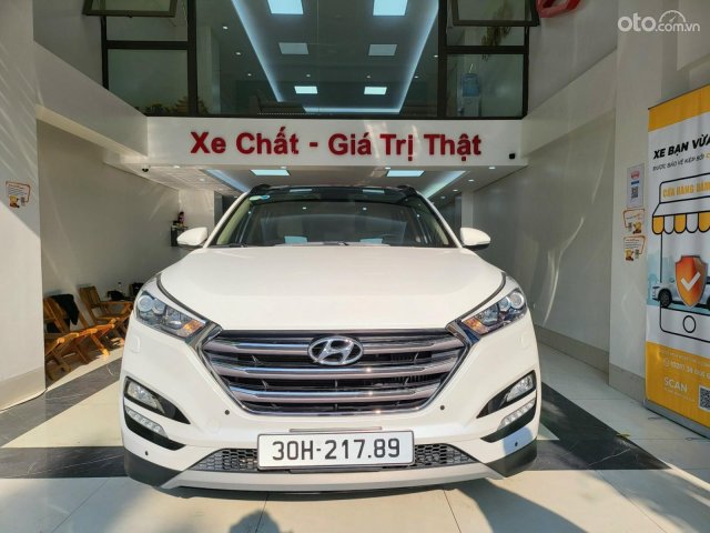 Bán xe Tucson 1.6 Turbo năm 2018, màu trắng, xe đẹp biển Hà Nội, check test hãng thoải mái