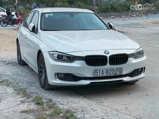 Siêu phẩm BMW 320i Model 2014 - Nhập Đức - Nội thất kem - 1 chủ từ đầu - Biển Sài Gòn0