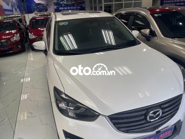 Cần bán xe Mazda CX-5 2.0AT sản xuất năm 2016, màu trắng0