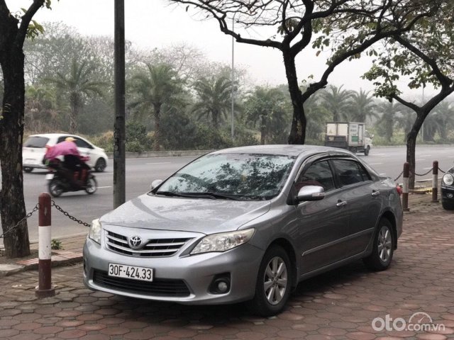 Bán xe Toyota Corolla Altis 1.8G AT năm 2012, màu xám bạc, cá nhân chính chủ đăng ký được 3 ngày vẫn còn mùi giấy mới