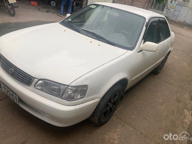 Cần bán xe Toyota Corolla 1.8E MT đời 1997, màu trắng, nhập khẩu0