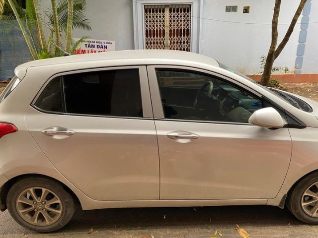 Bán Hyundai Grand i10 1.2MT sản xuất năm 2014, màu vàng đồng, xe ten tư nhân0