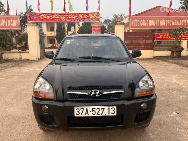 Xe Hyundai Tucson 4WD sản xuất 2009, màu đen, nhập khẩu nguyên chiếc