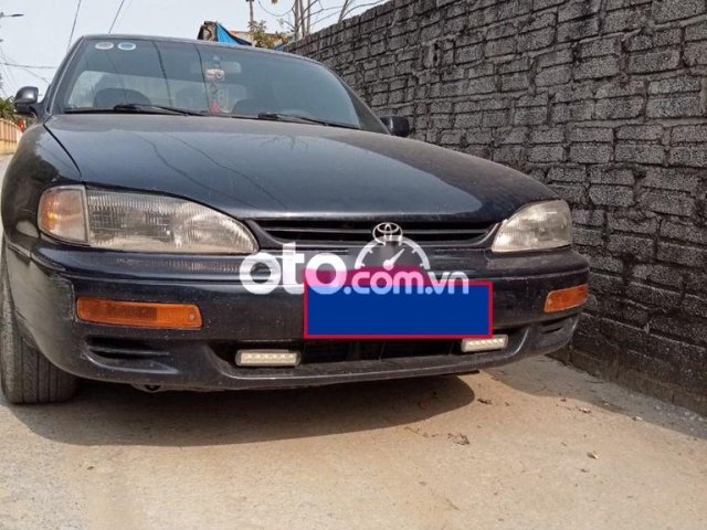 Cần bán gấp Toyota Camry năm sản xuất 1996, màu đen, nhập khẩu Nhật bản số tự động